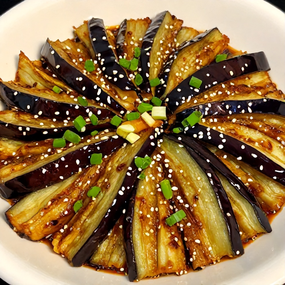 Plated miso glazed eggplant with green onions