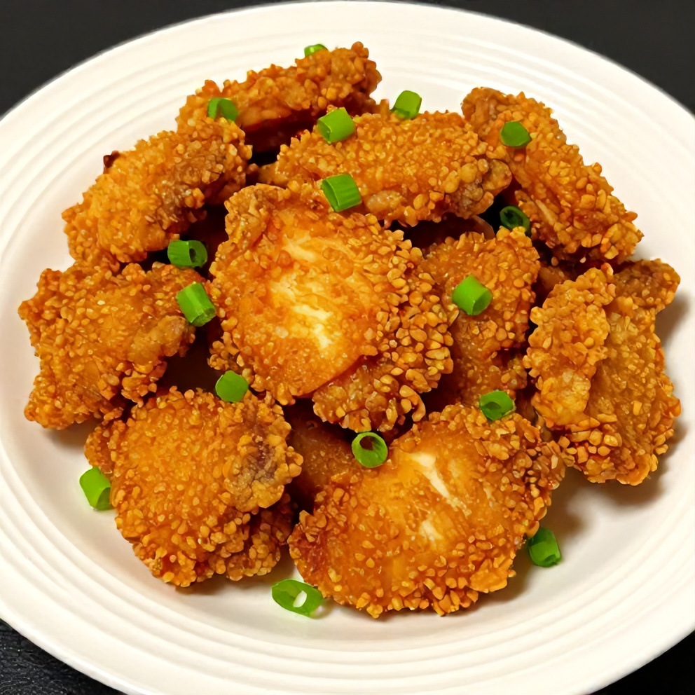 Crispy Honey Garlic Chicken on a white plate