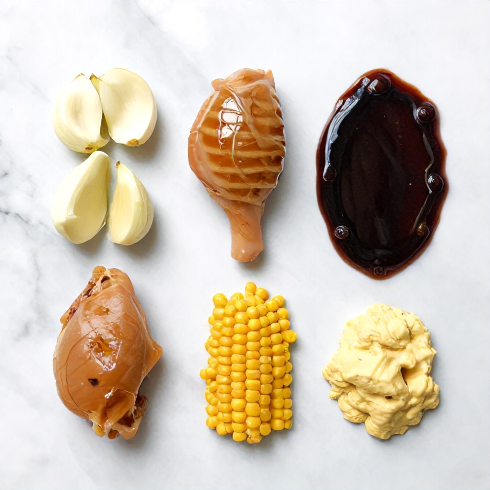 Honey, garlic, chicken, soy sauce, and cornstarch on a wooden surface